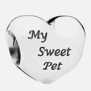 NEW Pandora My Sweet Pet heart charm. Sterling Silver with animal paw prints.